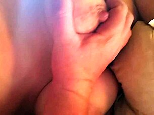 Cougar wife shows big tits.