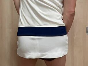 asian girl in tennis uniform teases ass