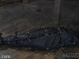 Girl is restrained in the garage and receives punishment for her actions