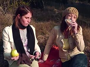Outdoor Picnic Turns Into Lesbian Strapon Sex For Two Brunette Friends With Kissing And Riding