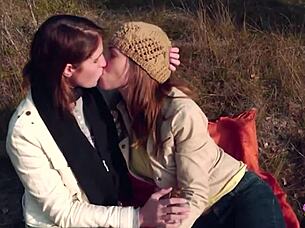 Outdoor Picnic Turns Into Lesbian Strapon Sex For Two Brunette Friends With Kissing And Riding