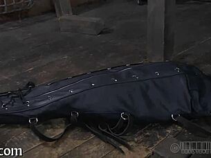 Girl is restrained in the garage and receives punishment for her actions