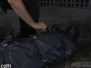 Girl is restrained in the garage and receives punishment for her actions