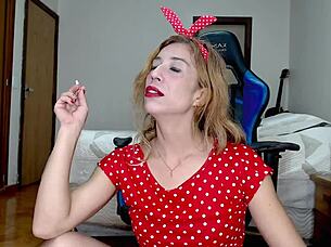 Brazilian slut smokes while showing off her pussy