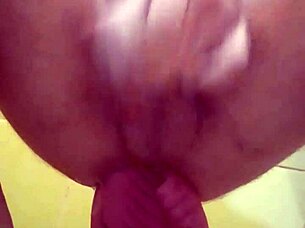 Whore's ass stretched with fisting and monster cock for male squirt