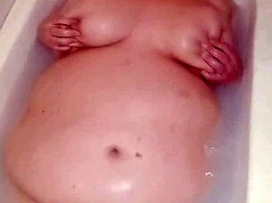 Curvy Wife's Big Natural Tits Bounce During Intense Naked Pussy Play in Bathtub.