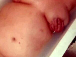 Curvy Wife's Big Natural Tits Bounce During Intense Naked Pussy Play in Bathtub.