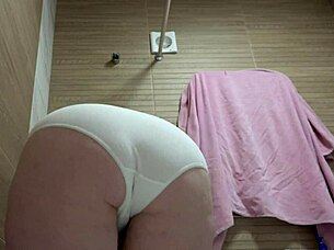 i love watching this mature bbw piss on her pussy in white panties from below