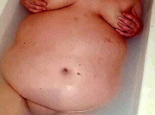 Curvy Wife's Big Natural Tits Bounce During Intense Naked Pussy Play in Bathtub.