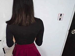 Sexy Laura in red skirt gets spanked and penetrated against the wall.