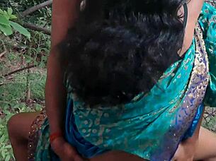 Desi hot Santhali bhabhi gets outdoor fucking with muscular bodybuilder, her big clit and hairy pussy exposed.
