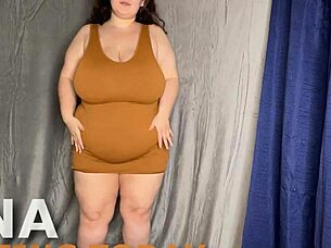 curvy babe shows big tits and plump belly