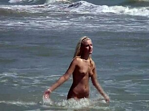 Gorgeous Teen Bathes In The Ocean
