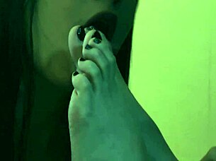 Redhead slave licks barefoot latina's feet