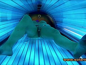 Hidden Solarium Cam Catches Beautiful Woman in Intimate Masturbation Session