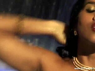 pretty asian woman gently cleanses her naked body in a soothing ritual