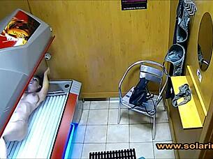 Hidden Solarium Cam Catches Beautiful Woman in Intimate Masturbation Session