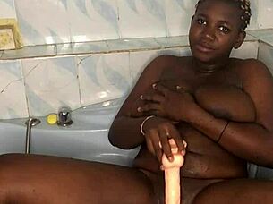 Amateur Squirts With Huge Dildo In Bathroom