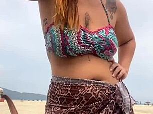 Young African Girl Gets Naked On Beach, Grabs Hard Cock