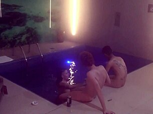 Friends engage in bareback threesome by the motel pool