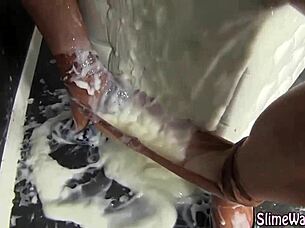 babe gets messy slime facial at gloryhole