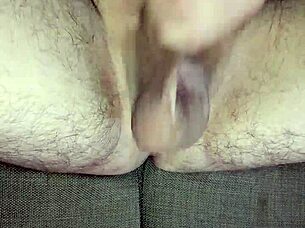 Jerking off huge uncircumcised cock to orgasm.