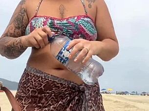 Young African Girl Gets Naked On Beach, Grabs Hard Cock