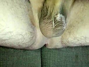 Jerking off huge uncircumcised cock to orgasm.