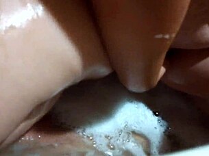 Plump mom washes pussy tits