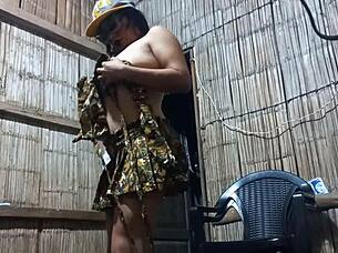 Military stepmom performs erotic dance for sergeant, revealing her breasts and touching her vagina