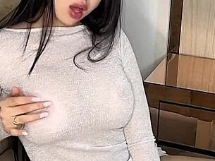 This latina babe plays with her huge dildo