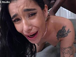 Skinny redhead takes piss and tastes big black cock