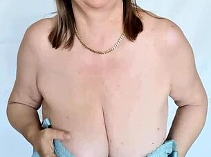 Mature Busty Milf in Stockings and High Heels Poses