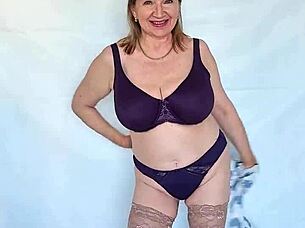 Mature Busty Milf in Stockings and High Heels Poses