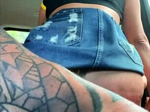 Brunette exhibitionist gives handjob in car with ass licking