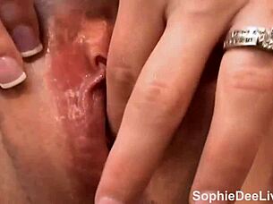 sophie dee masturbates her wet pussy on the stairs in solo action