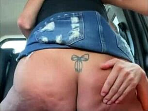 Brunette exhibitionist gives handjob in car with ass licking