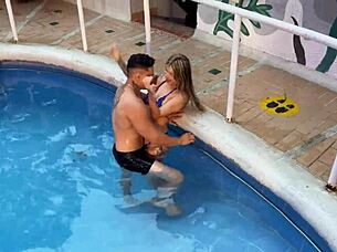 Fucking a stranger in the hotel pool while her boyfriend rests. Skinny Latina shows wet pussy and big ass.