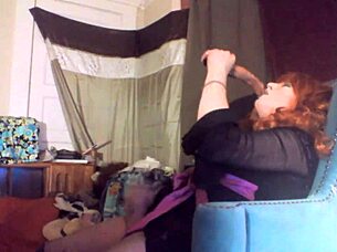 Redheaded Tranny Swallows Vibrating Dildo