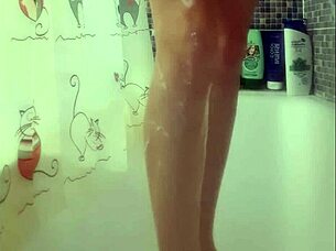 Busty teen washes her perfect feet in the shower