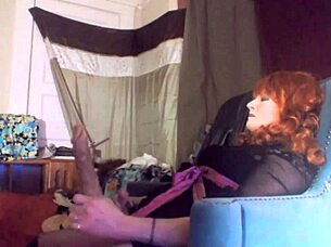 Redheaded Tranny Swallows Vibrating Dildo