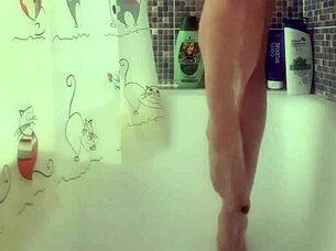 Busty teen washes her perfect feet in the shower