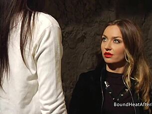 Look at this submissive lesbian slave bent over and tied up, orgasming from strapon domination