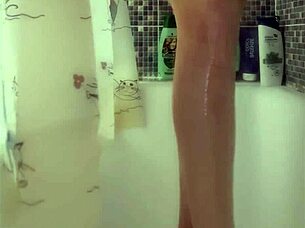 Busty teen washes her perfect feet in the shower