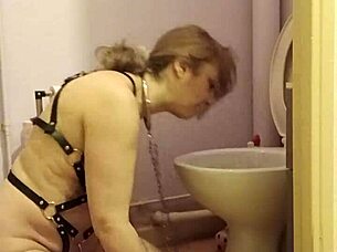 feeling like a whore, bent over in bondage, licking the toilet