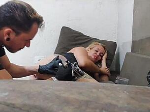 latina gets tattoo with anal plug in ass