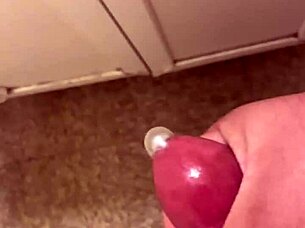 Watch me masturbating with a condom on my cock