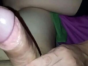 She massages my dick while watching porn, then milks it dry