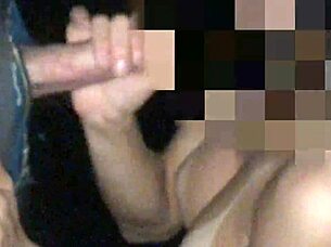 Wet handjob through glory hole, milking cum from the source