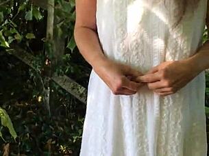 Slave bound in handcuffs gets spanked and pissed on outdoors